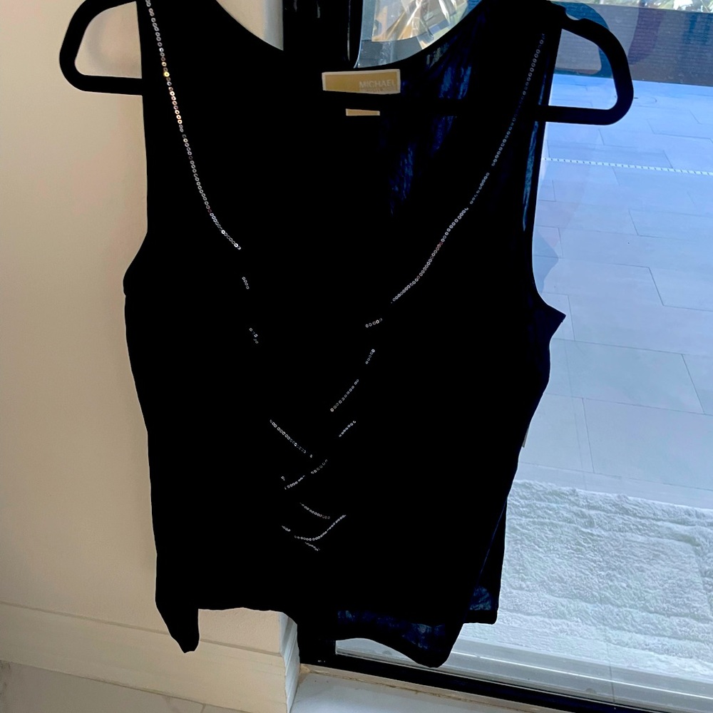 Super cute Black with sequence MK top.
